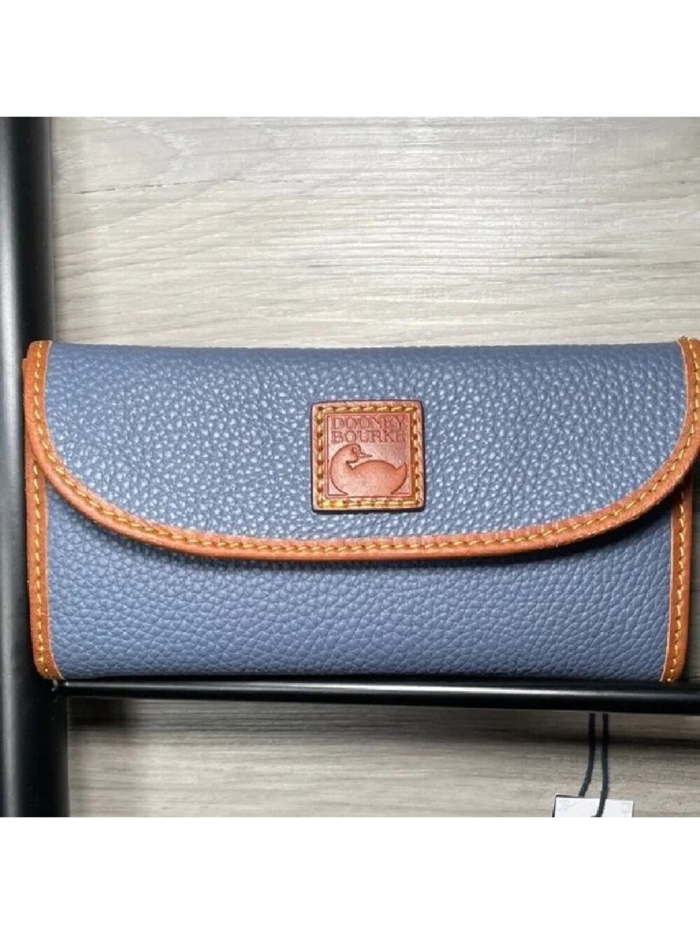 NWT- Dooney & Bourke Duck Logo Pebble Leather Continental Clutch, Steel Blue